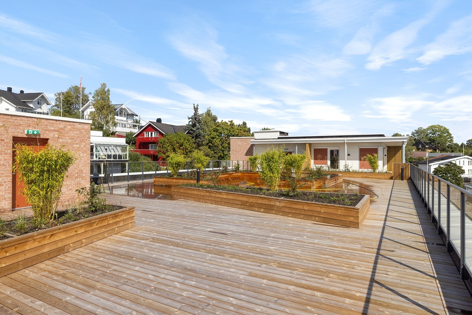 Fantastisk felles takterrasse i 5. etasje, med enkel adkomst via heis i samme bygg, til glede for beboerne Galleribilde