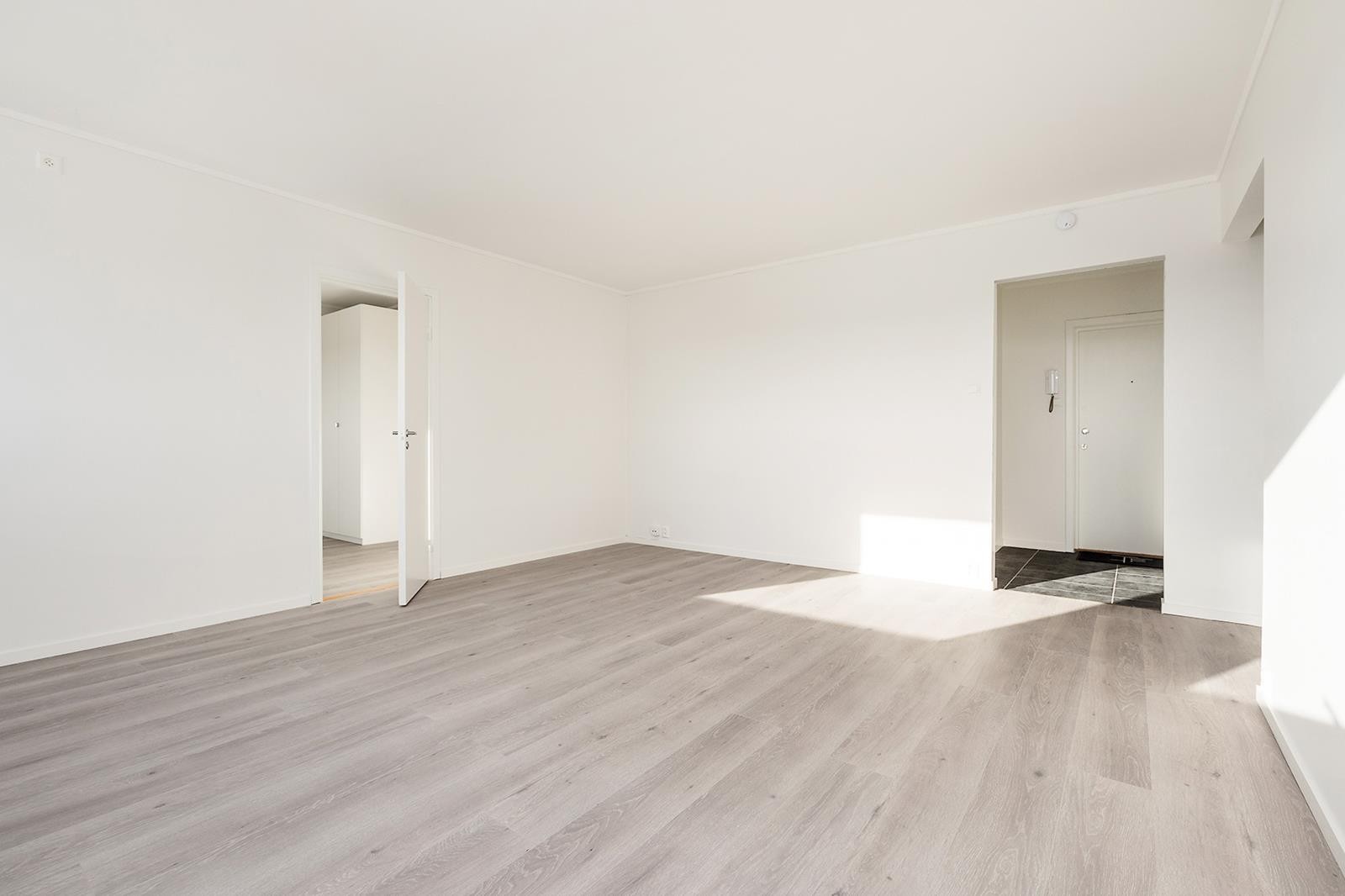 Stuen er enkel å møblere Galleribilde