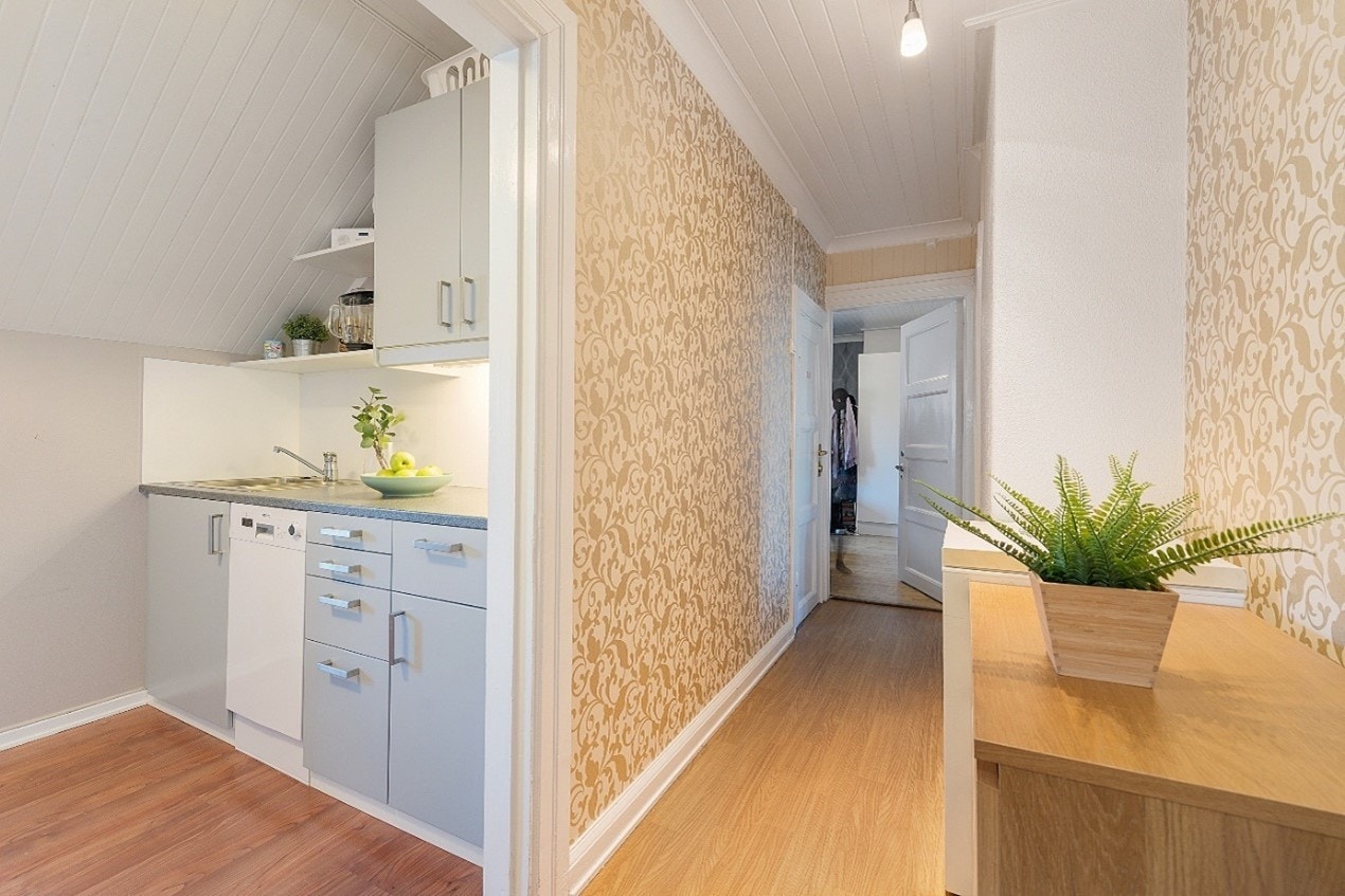 Koselig loftsleilighet på Solsiden i en fin bygård Galleribilde