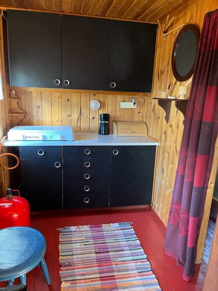 Kjøkken krok med gasskomfyr. Galleribilde