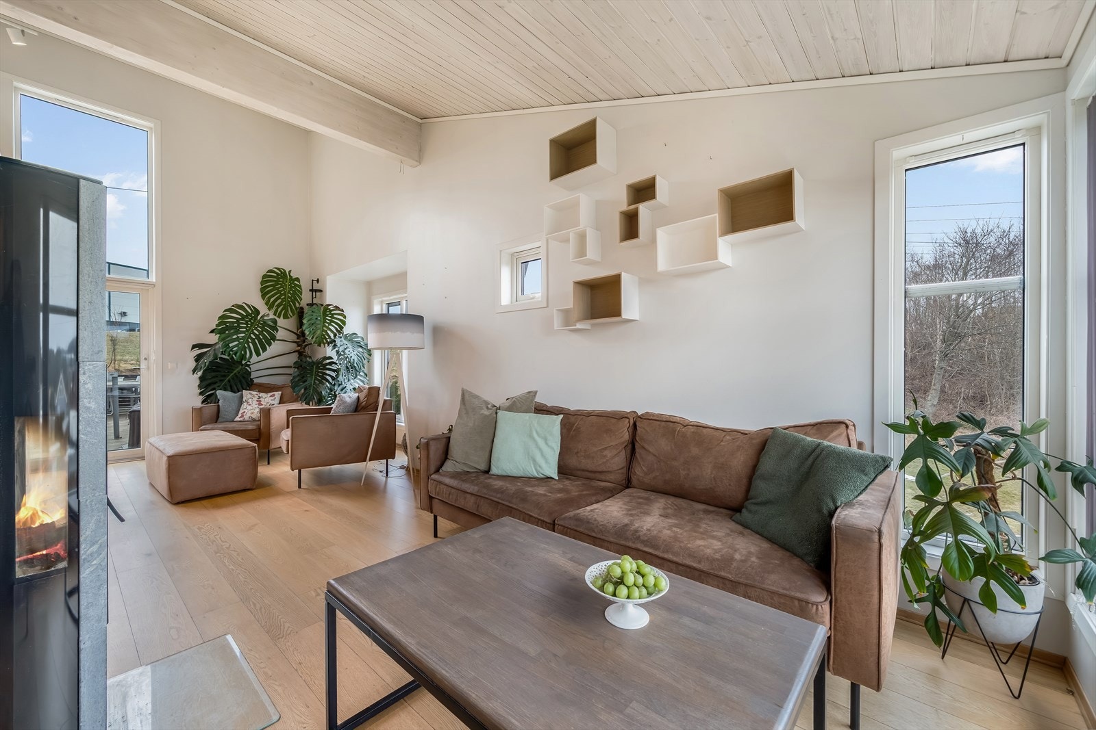 Stuens utforming gir rom for innredning i soner. Galleribilde