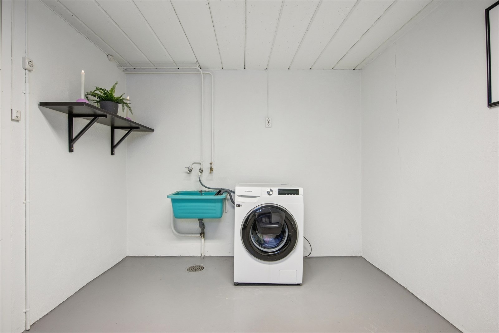 Det separate vaskerommet i kjelleren er praktisk og funksjonelt. Galleribilde