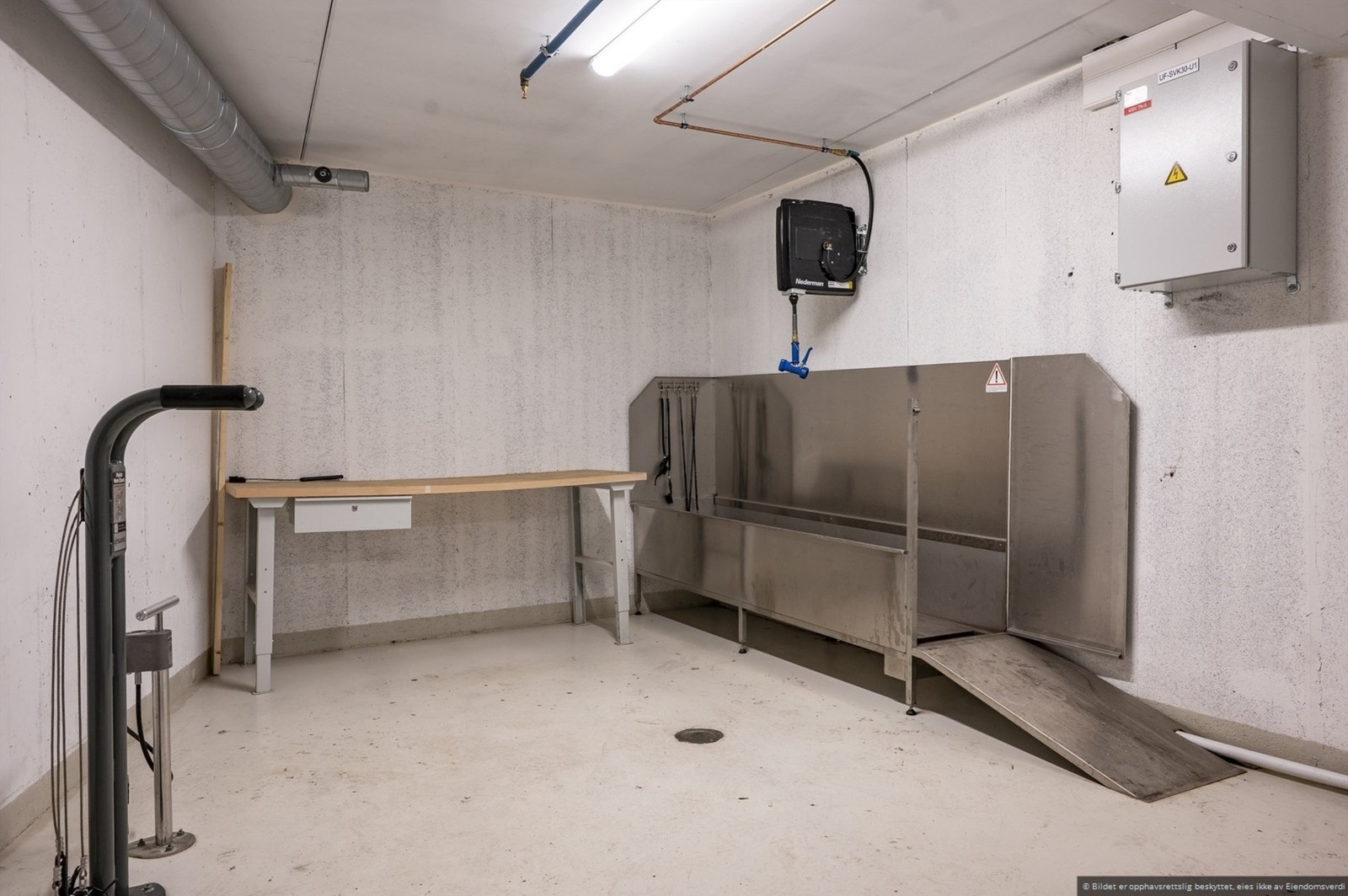 Det er felles sykkelparkering i sameiet. Galleribilde