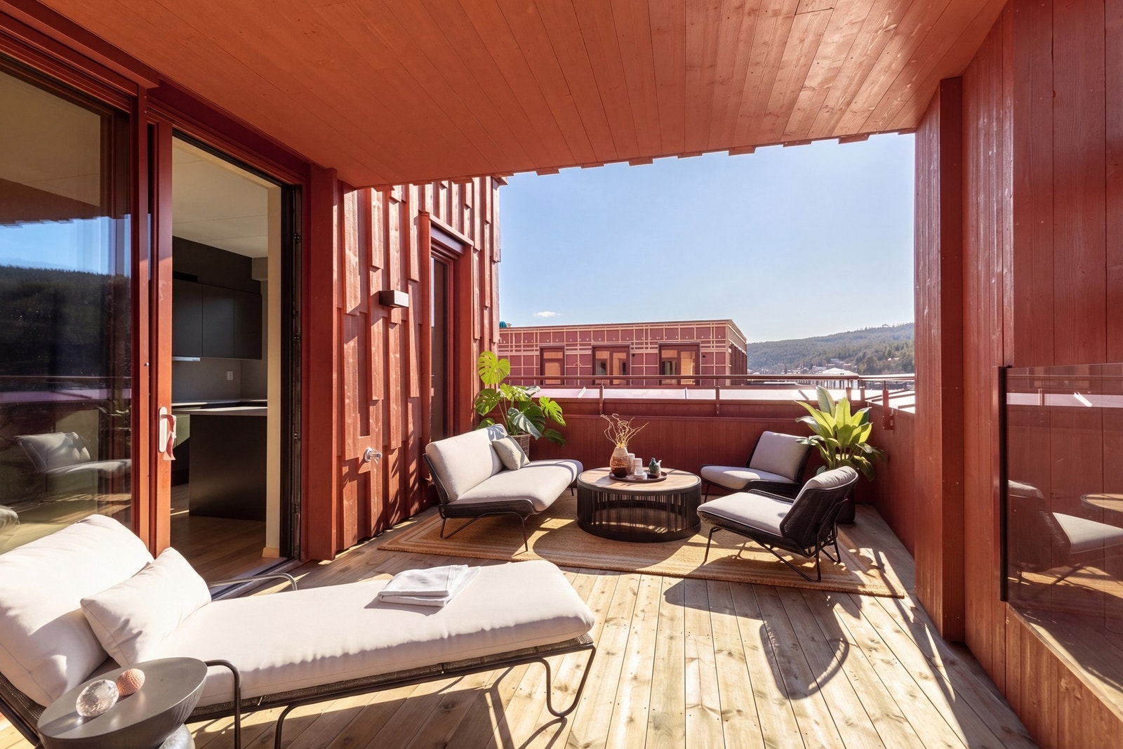 Leiligheten har en stor, delvis overbygget terrasse. Galleribilde