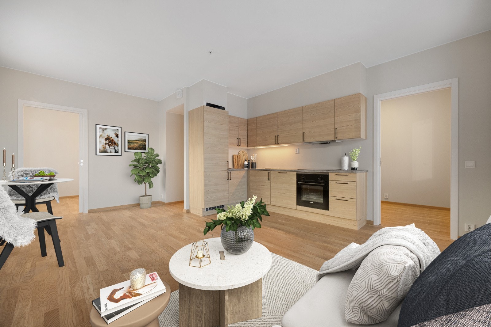 Leiligheten har et åpen og luftig allrom med plass til både spisebord og sofagruppe Galleribilde