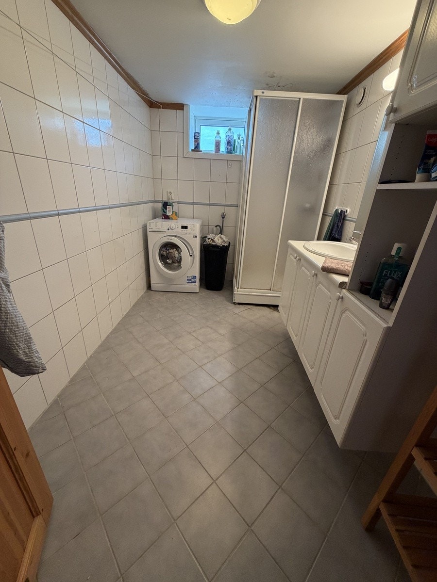 Leilighetens bad - flislagt Galleribilde
