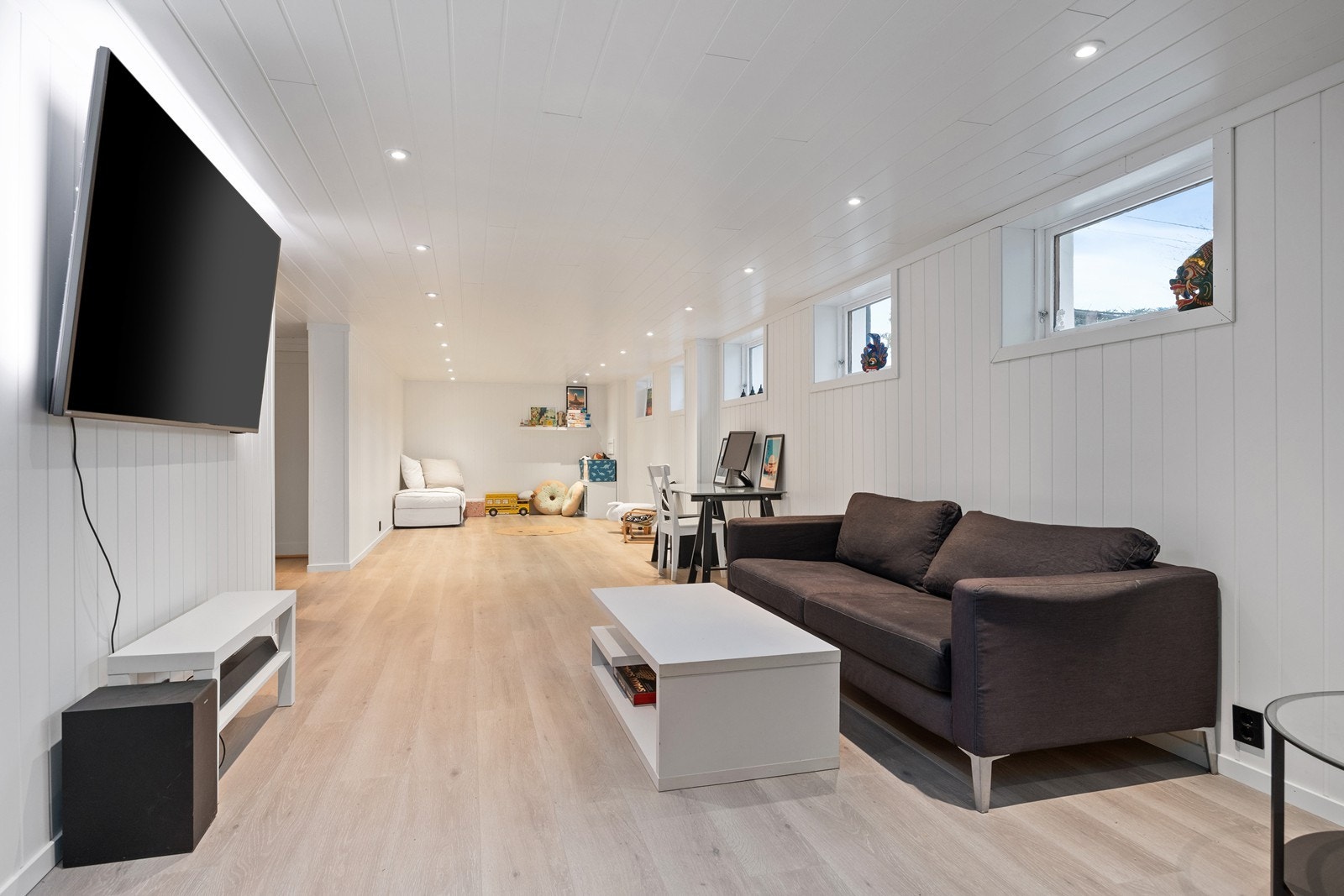Kjellerstuen er et fleksibelt rom som gir ekstra plass og mange bruksmuligheter. Galleribilde