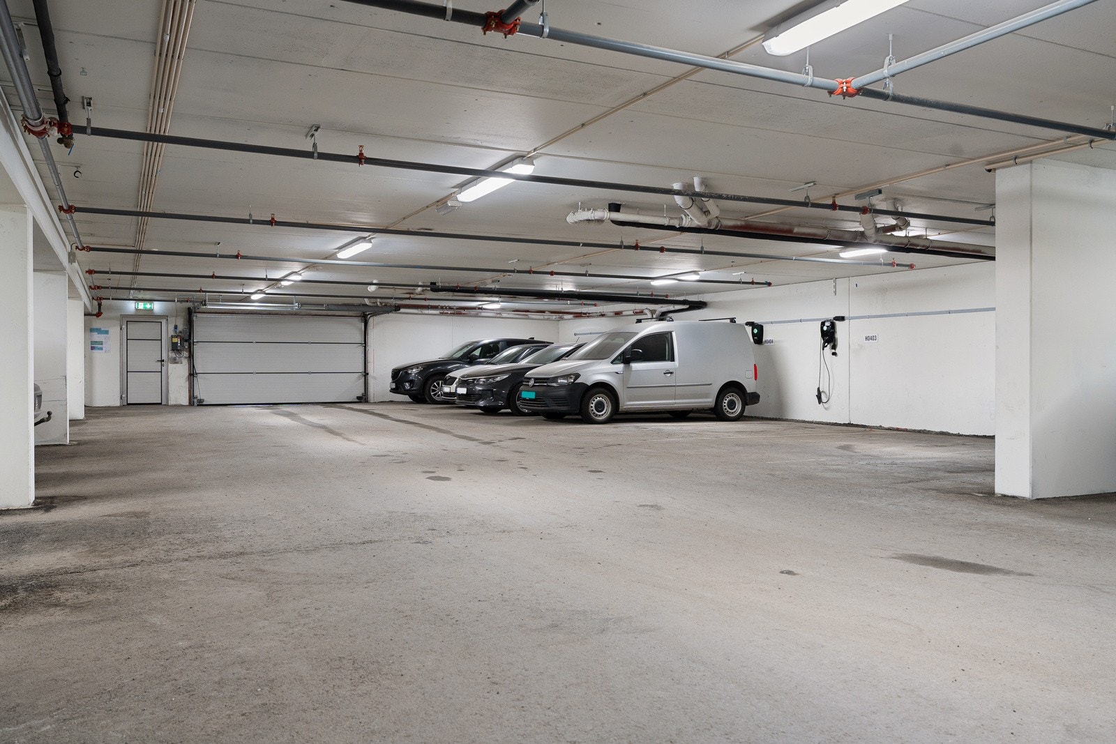 Garasjeplass i felles garasjeanlegg i underetasje.