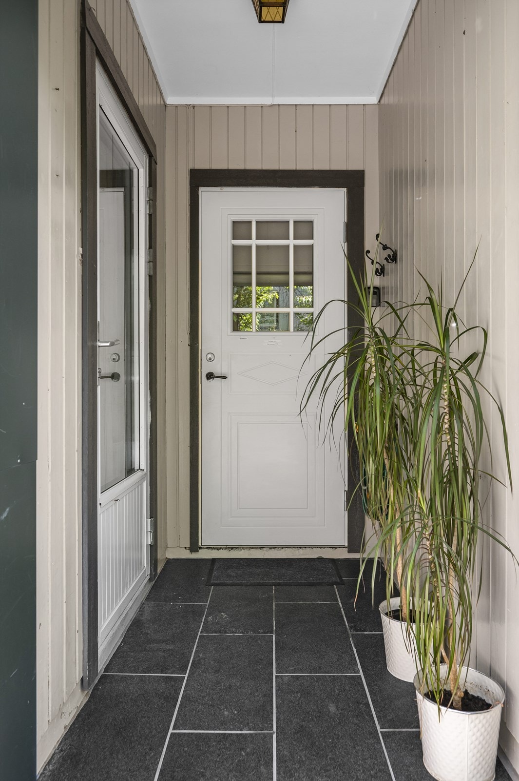 Her disponerer du også en utendørs bod, rett utenfor entrèen. Galleribilde
