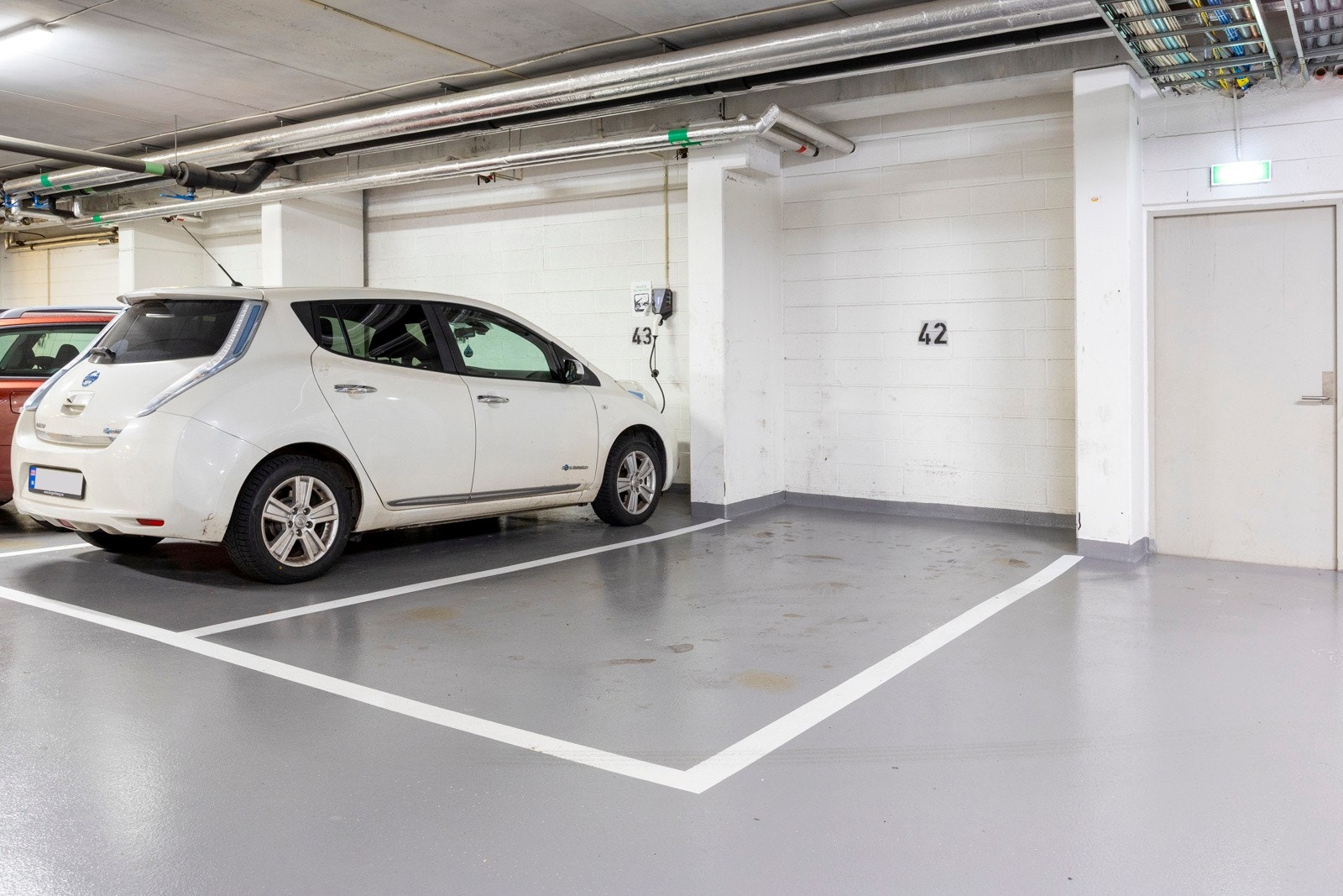 Plass nr. 42 i De Nye Grønlandskvartalene Garasjesameie (solgt). Galleribilde