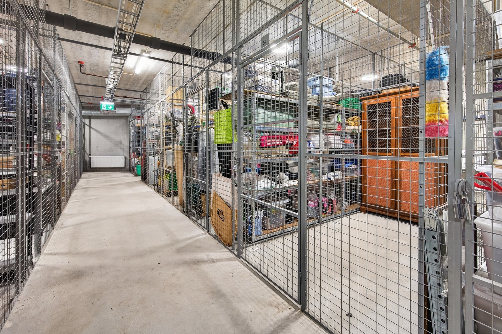 Låsbar nettingbod på omtrent 5 kvm i kjeller - merket med nr. 57 Galleribilde