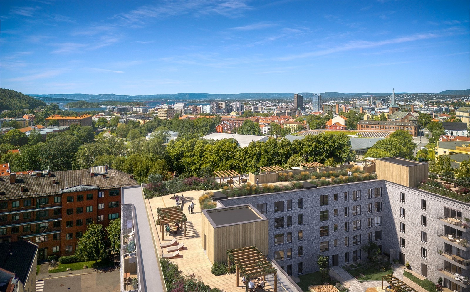Alle leilighetene i Kampenhagen får tilgang til felles takterrasse med fantastisk utsikt og solforhold, en trivelig bakhage og sykkelparkering Galleribilde