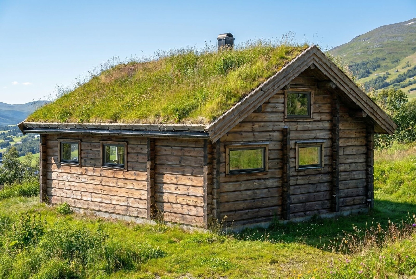 Flåtjønn - en klassisk og effektiv hytte. Illustrasjonsfoto Galleribilde