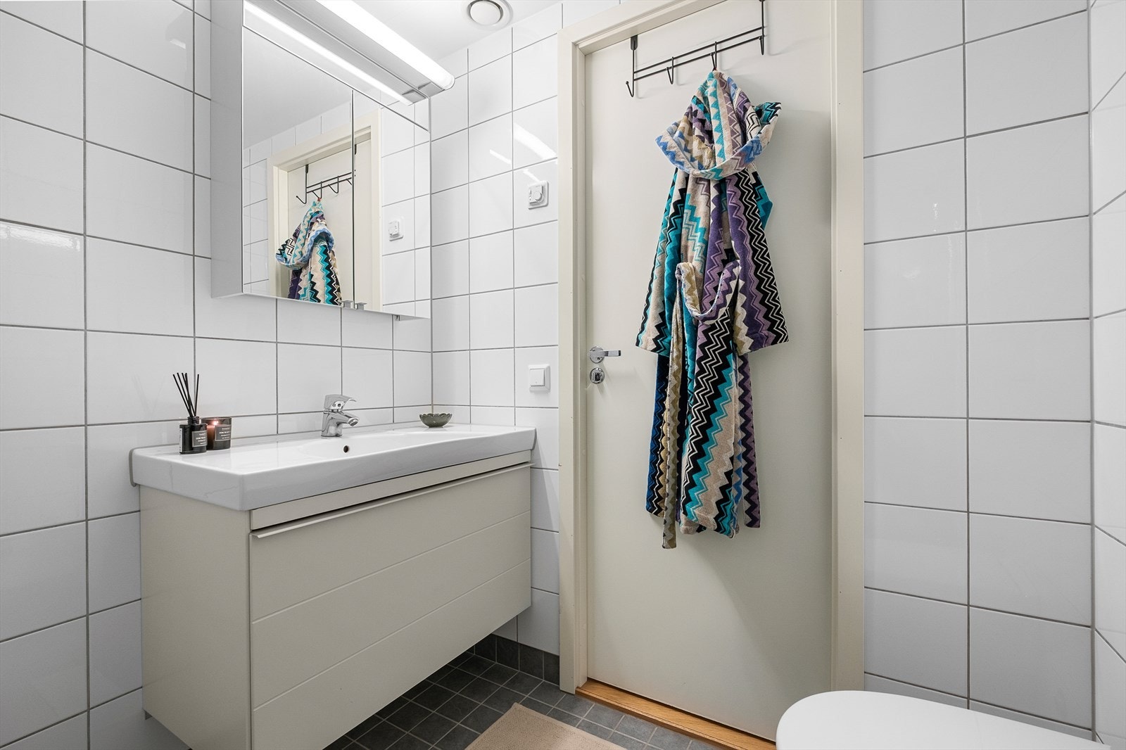 Badet har opplegg for vaskemaskin. Galleribilde
