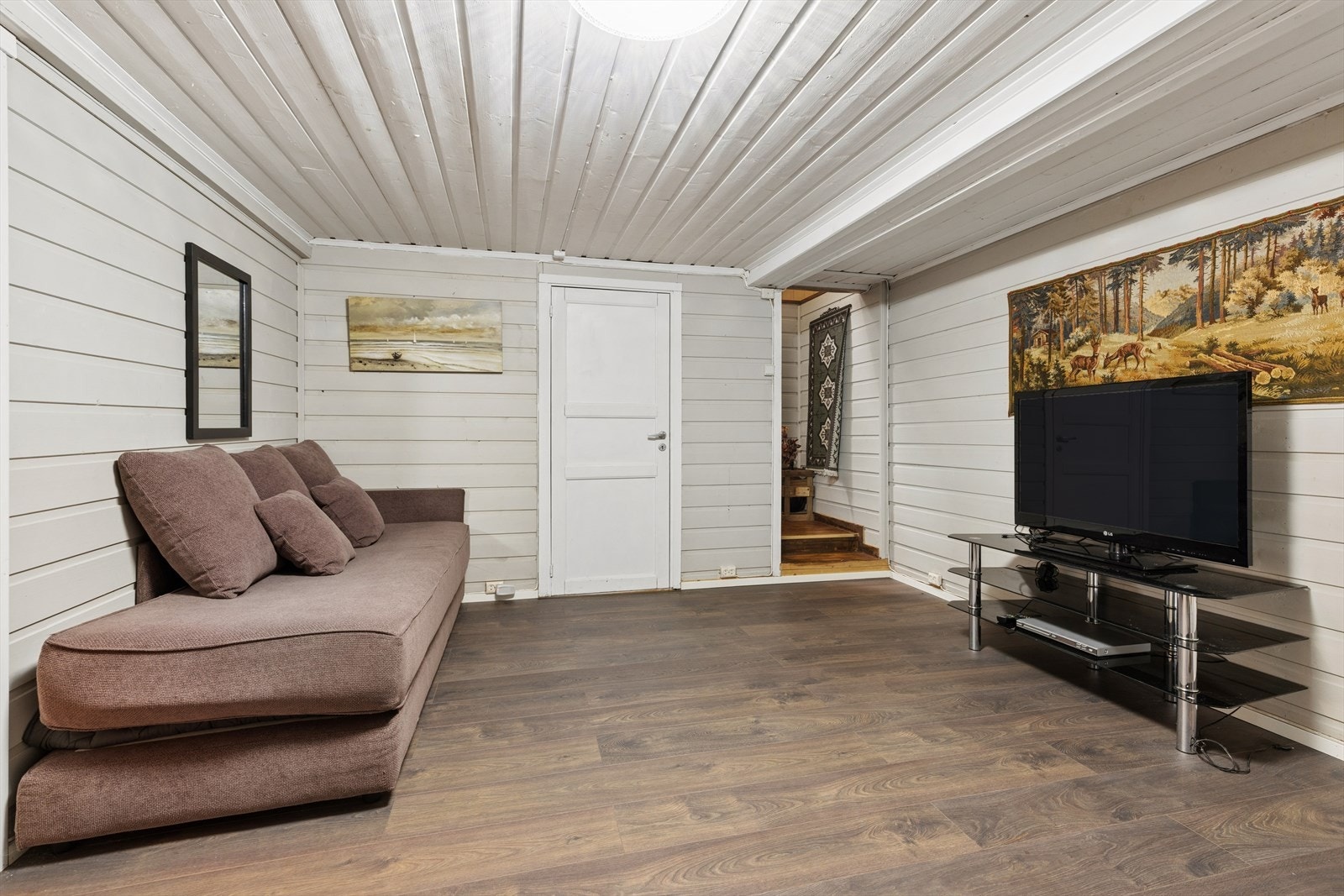 En ekstra stue gir fleksibilitet og flere soner for familien. Galleribilde