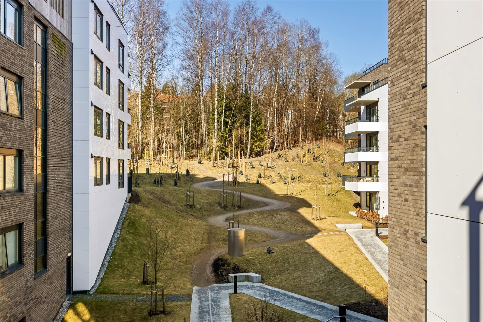 Et moderne og attraktivt boligområde som kombinerer det beste fra byliv og naturnære omgivelser. Galleribilde
