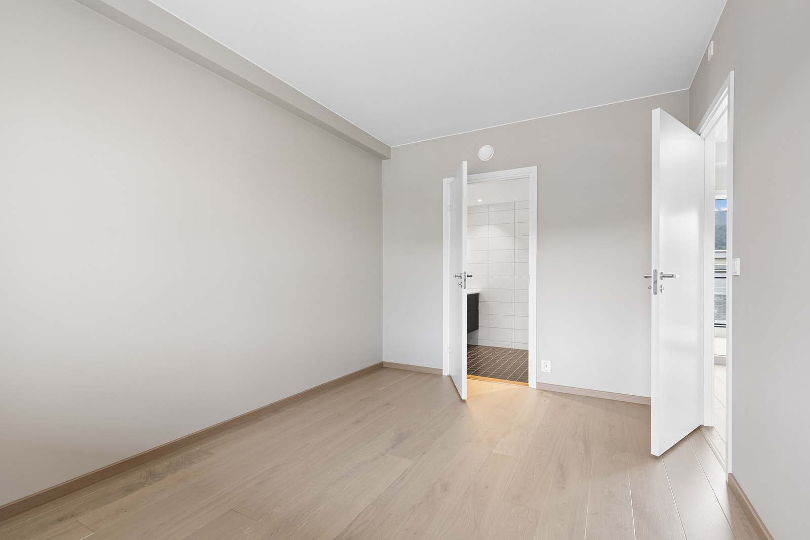 Leiligheten har to gode soverom, plassert i hver sin ende. Galleribilde