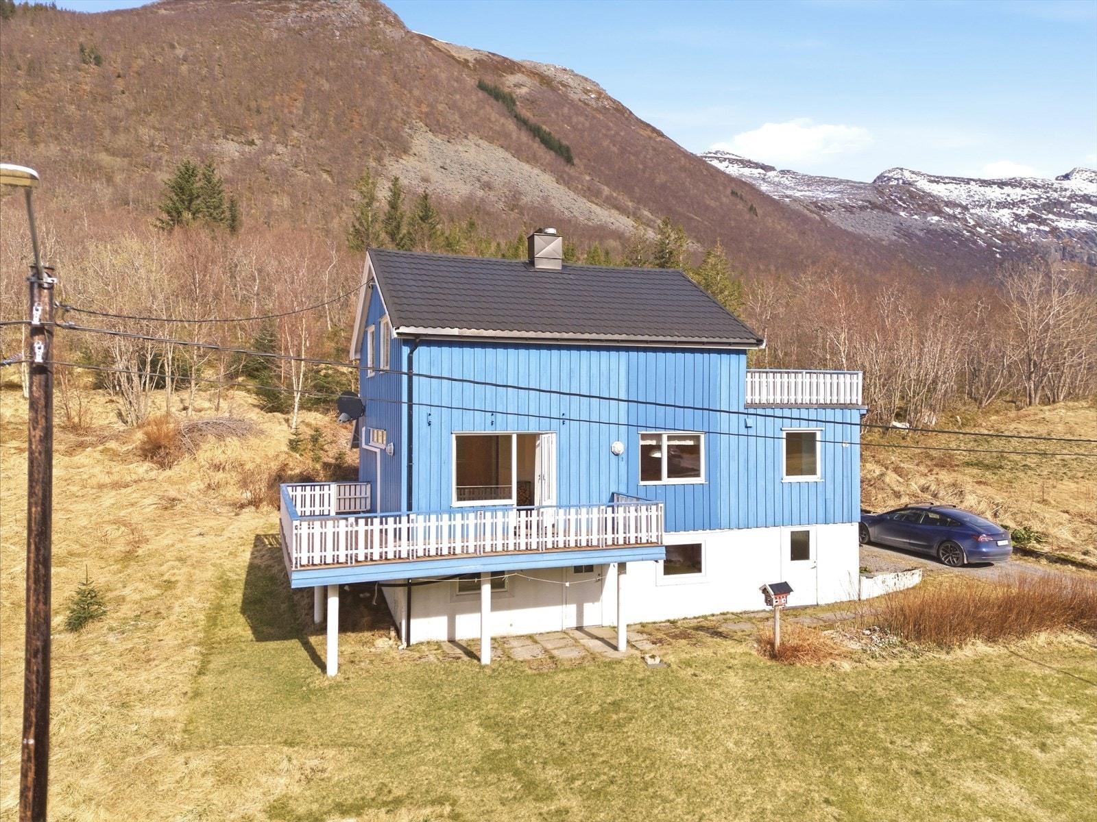 Et sjarmerende hjem, også kjent som det "koselige blå huset" Galleribilde