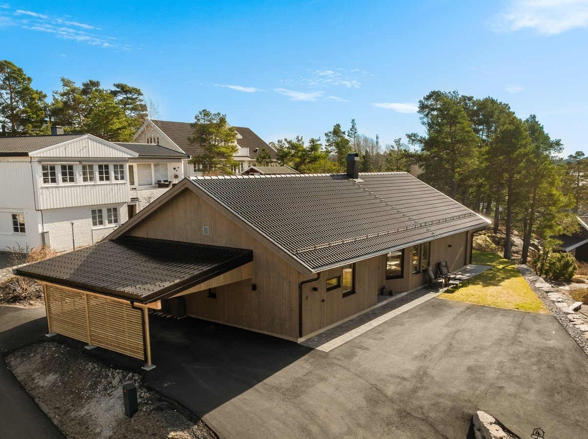 En lekker enebolig fra 2024 med alt på ett plan i et barnevennlig og attraktivt boligområde på Manstad. Galleribilde