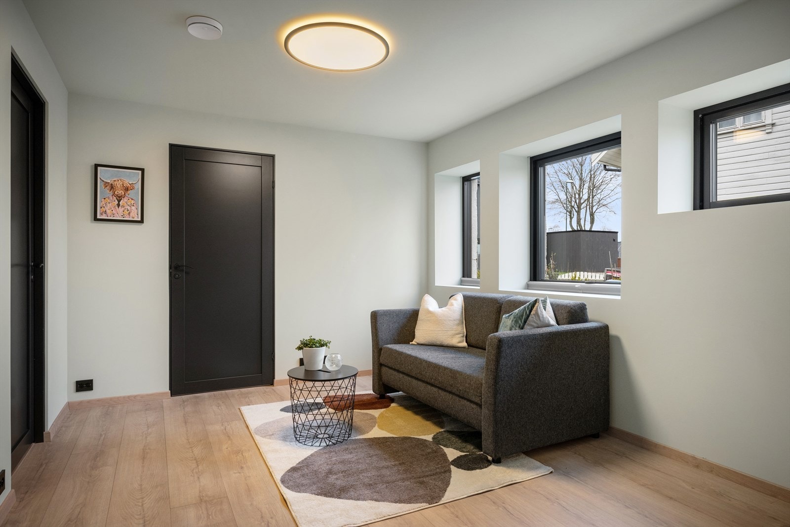 En liten sokkelstue i tilknytning til 2 soverom og et bad ekstra. Galleribilde