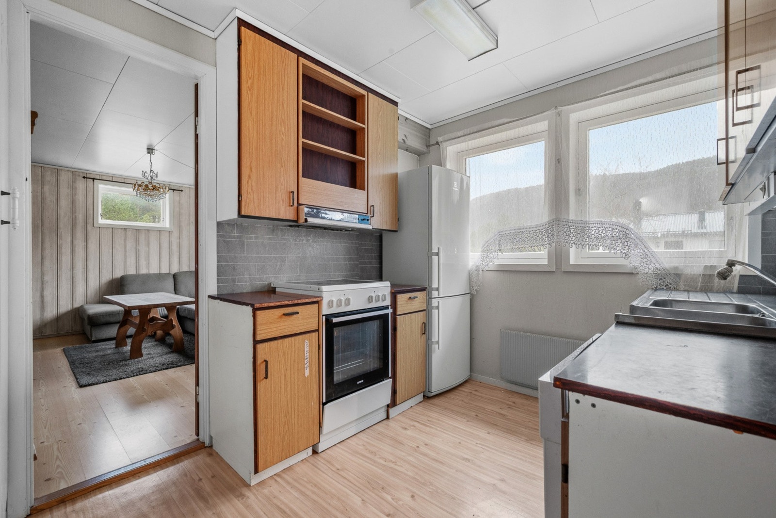 Kjøkkenet ligger i tilknytting stuen, og har et areal på ca. 9 kvm. Galleribilde