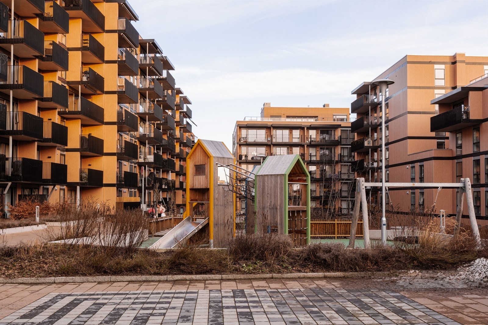 Barnevennlig nabolag med lekeplasser for de minste. Galleribilde