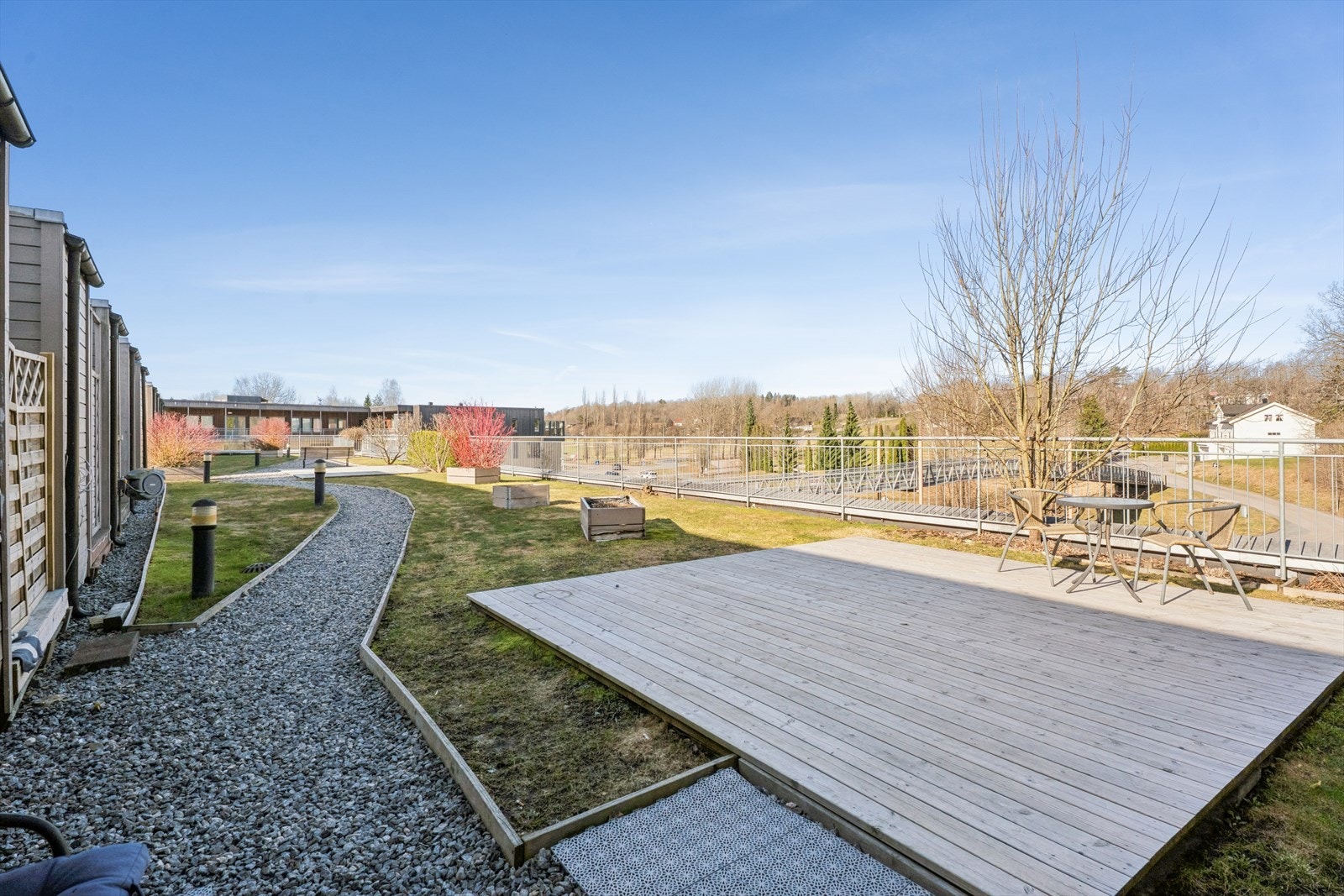 Felles takterrasse for beboerne med flott utsikt over omgivelsene og golfbanen. Galleribilde