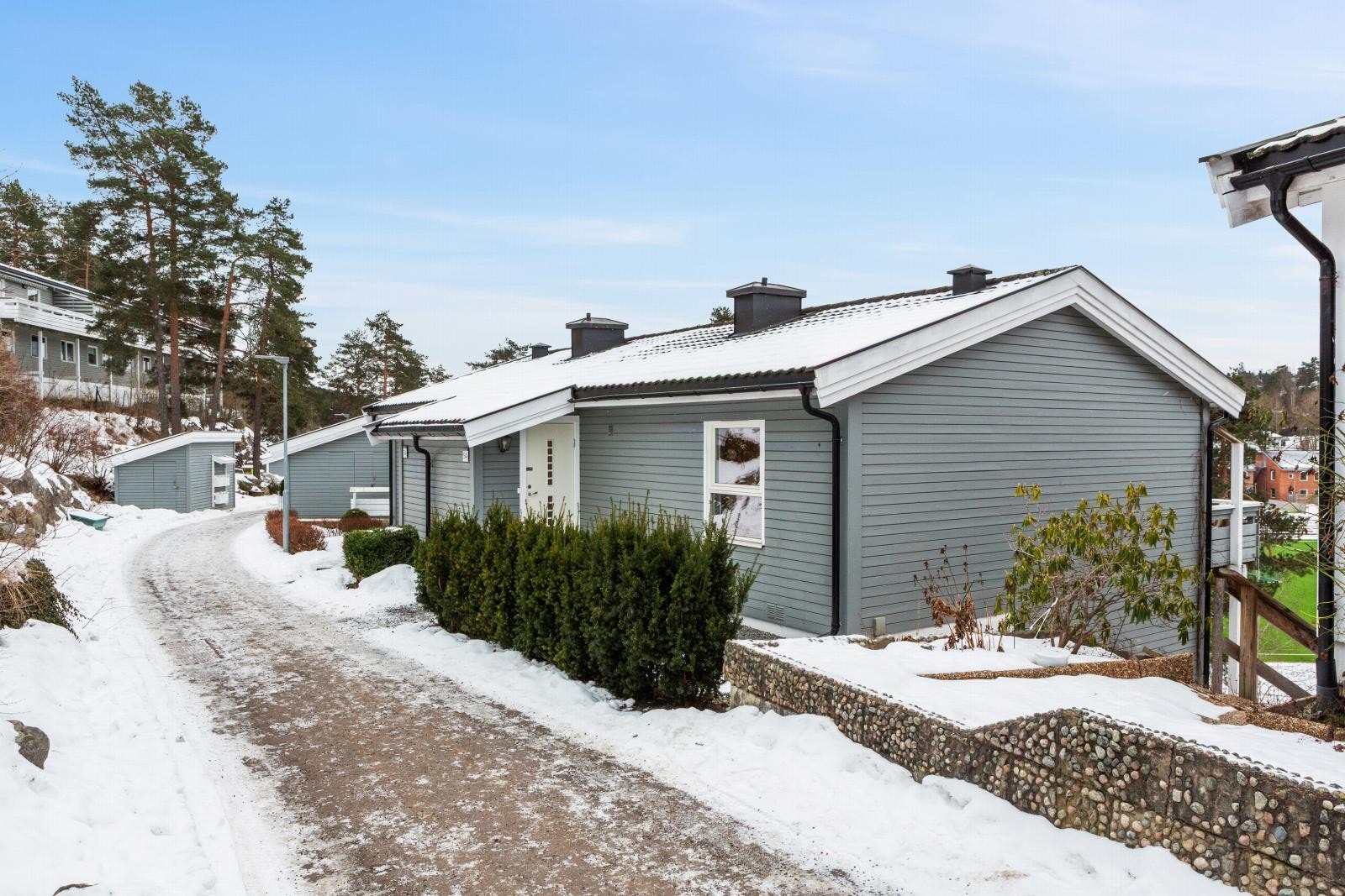 En hyggelig tomannsbolig i en rolig gate. Galleribilde