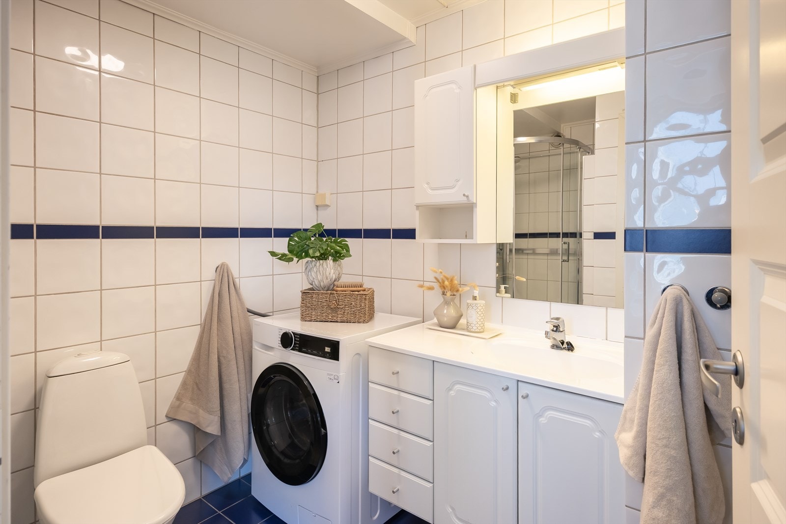 Flislagt bad med gulvvarme på 4,5 m². Galleribilde