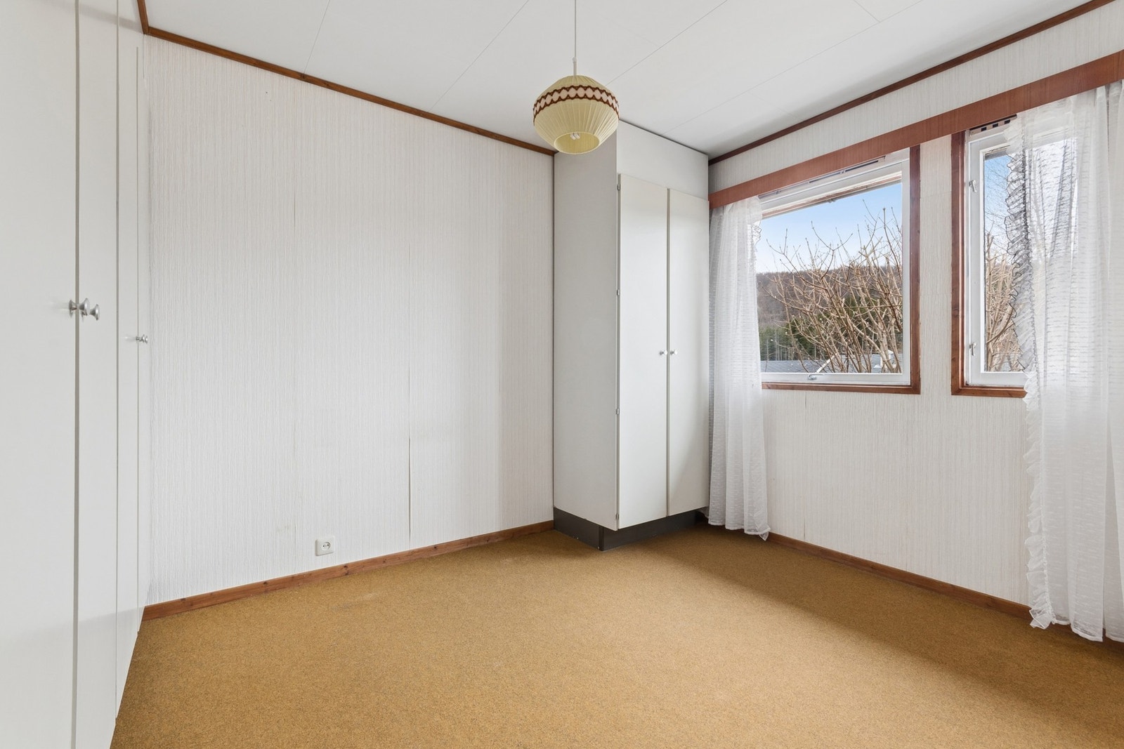 Det andre soverommet i samme etasje, med plass til seng og garderobeløsning. Galleribilde