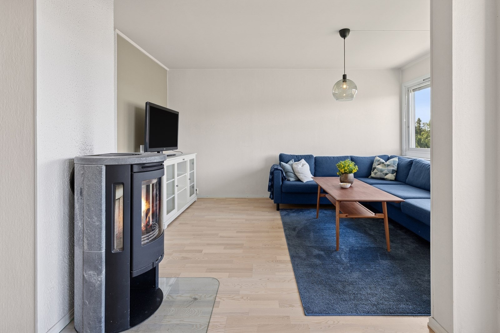 Sentralt plassert bidrar peisen til hygge og varme på kjølige dager. Galleribilde