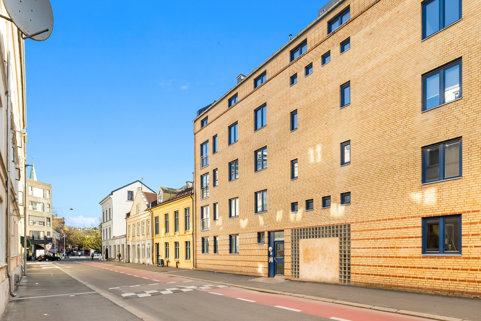 Fasade Norbygata 43. Her får du en velholdt leilighet i et moderne borettslag fra år 2000 med fokus på miljø og bærekraft. Galleribilde