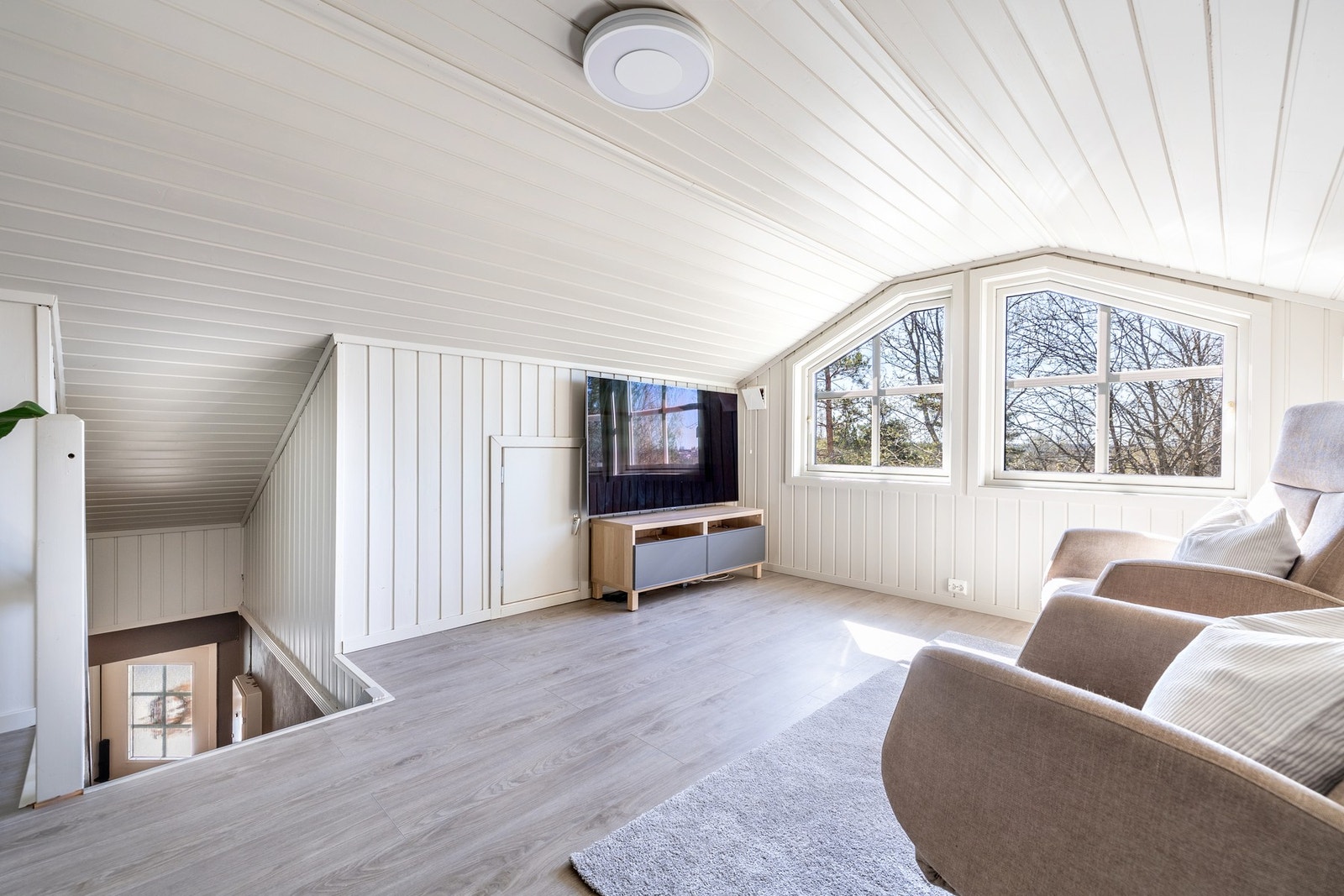 På loftet er det en koselig loftstue. Galleribilde