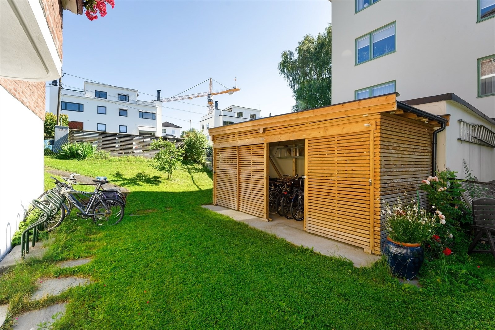 Utvendig sykkelbod fra 2021. Sameiet har også en innvendig sykkelbod Galleribilde