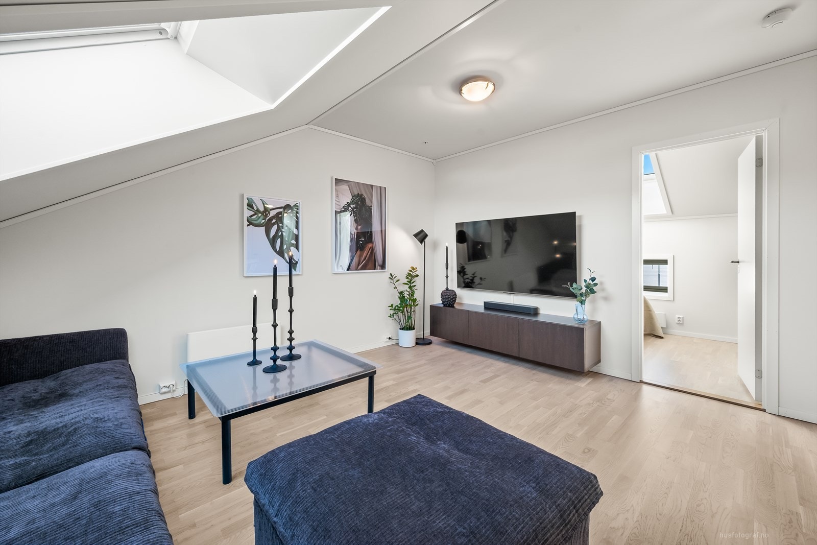 Med sine lune omgivelser gir stuen en koselig atmosfære for hele familien. Galleribilde