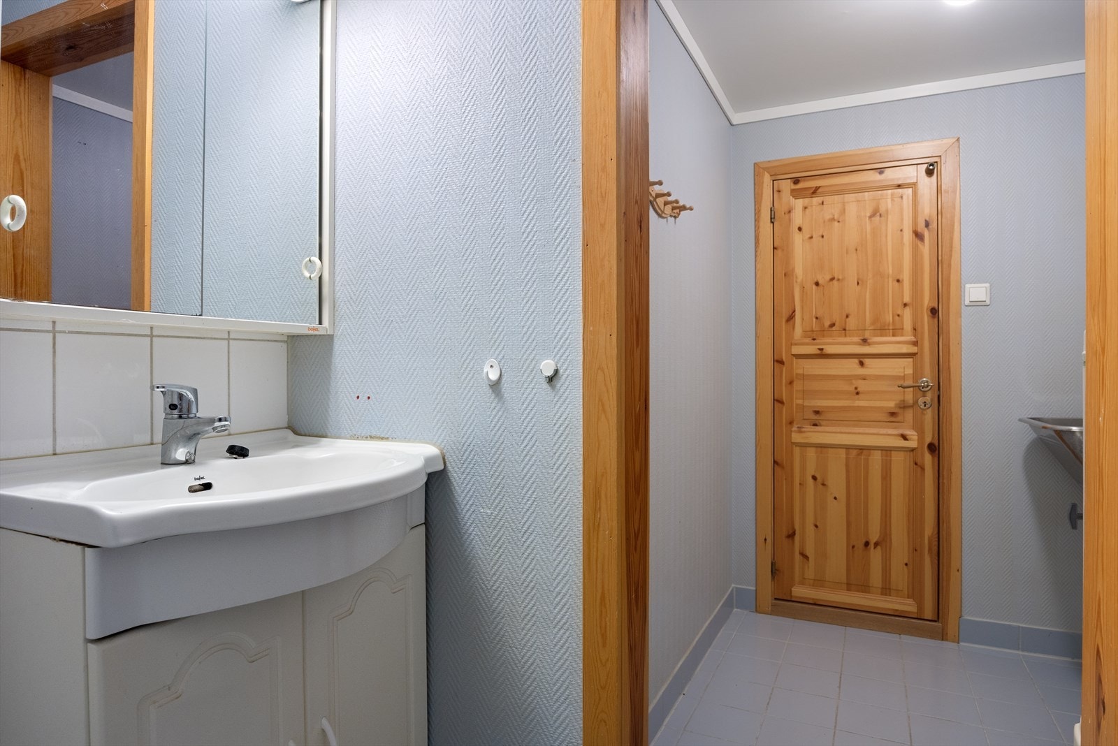 Ved siden av badet har du et praktisk vaskerom. Galleribilde