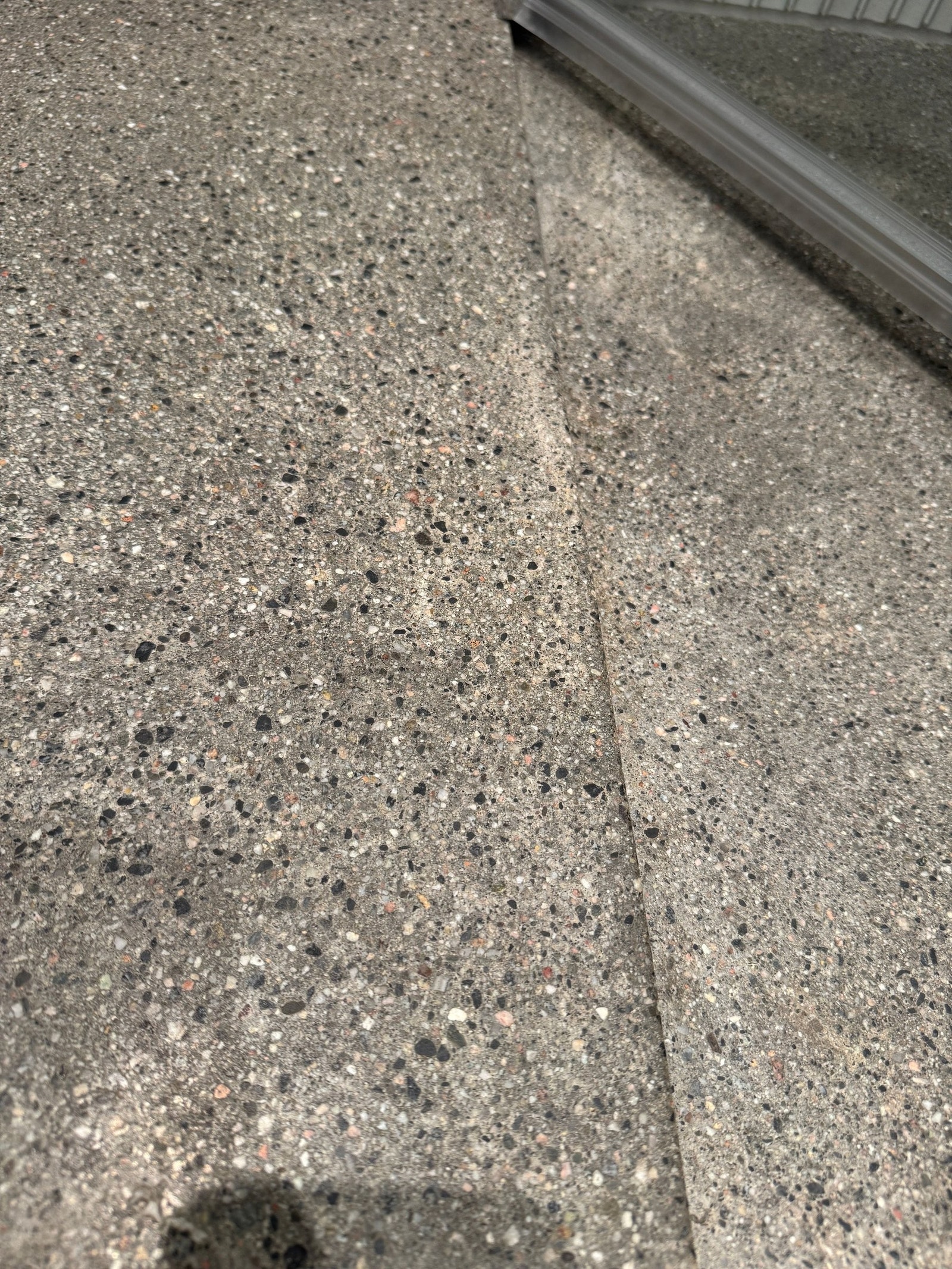 Betonggulv med terrasso look Galleribilde