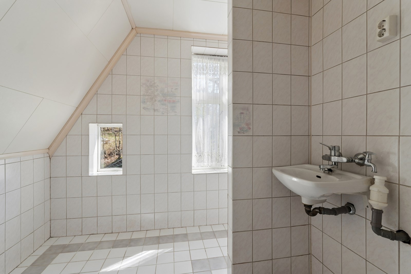 Badet har standard og løsninger som er typiske for byggeperioden. Galleribilde
