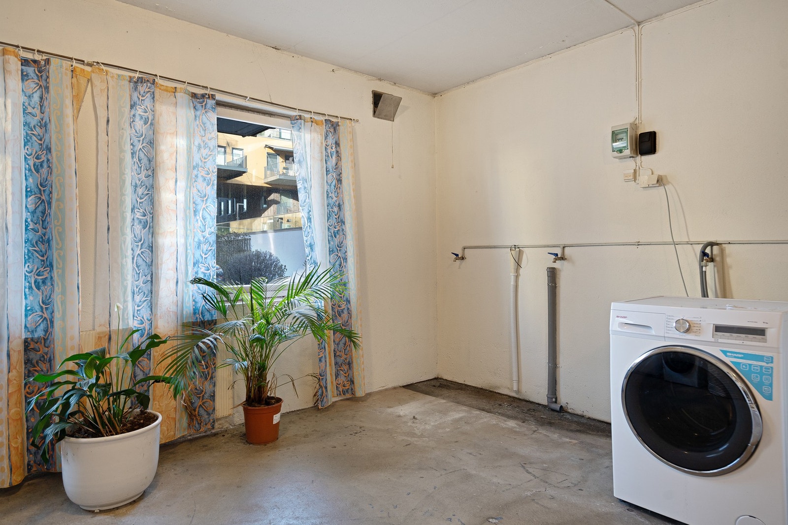 Felles vaskerom med avsatt plass for denne leiligheten (dersom du ikke vil ha vaskemaskin i leiligheten) Galleribilde