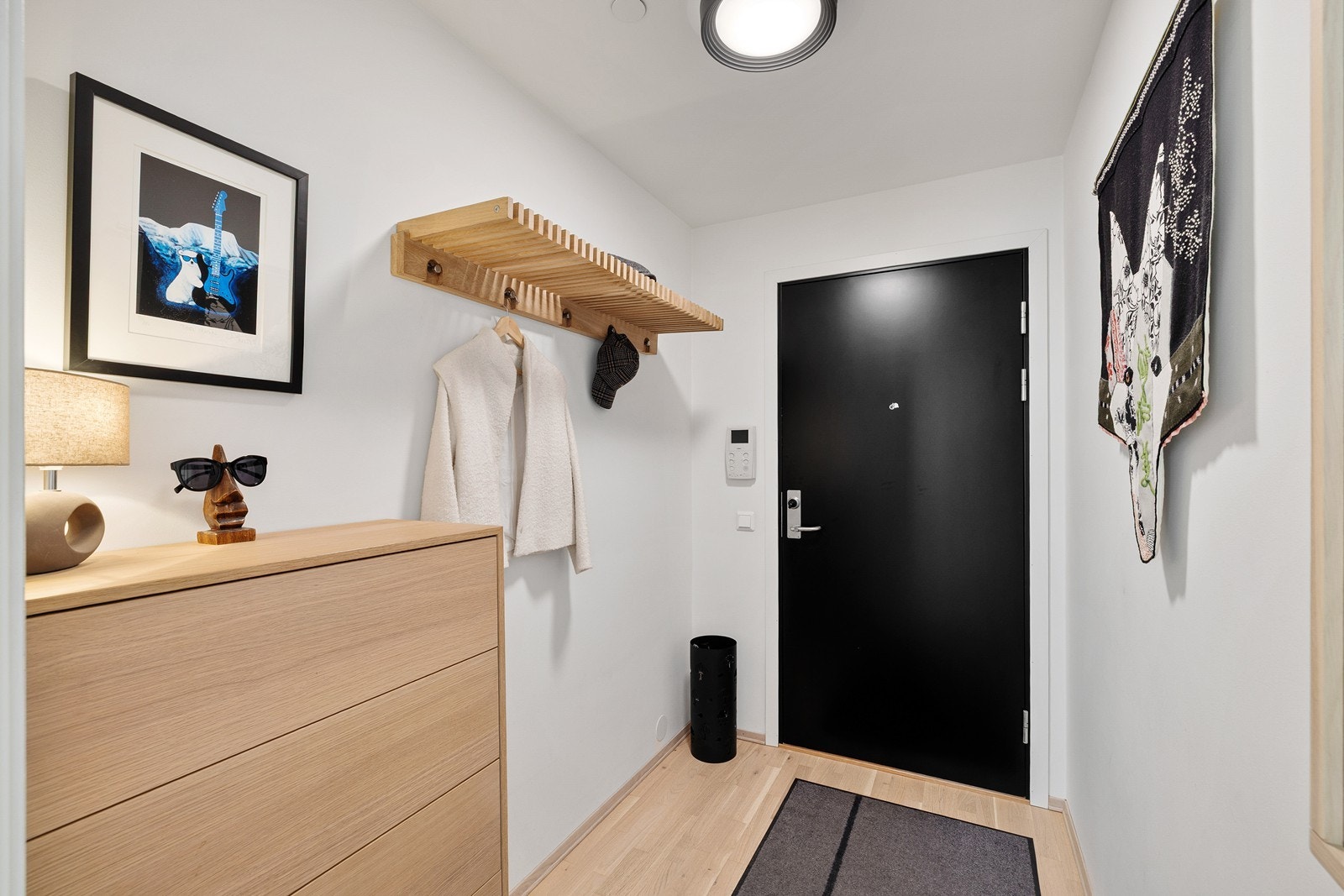 Du ønskes velkommen inn i en innbydende entré som gir et godt førsteinntrykk. Galleribilde