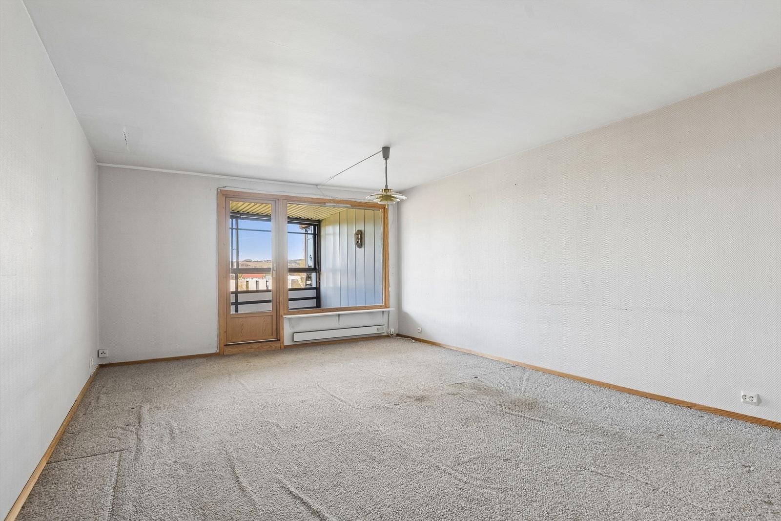 En arealeffektiv 2-roms leilighet på 56 m² med en praktisk planløsning og stort potensial. Galleribilde