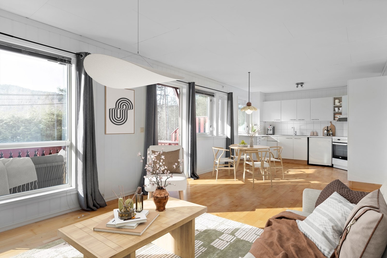 Digital styling viser hvordan leiligheten kan innredes med møbler og oppgraderes. Her er det rom for flere sittegrupper. Galleribilde