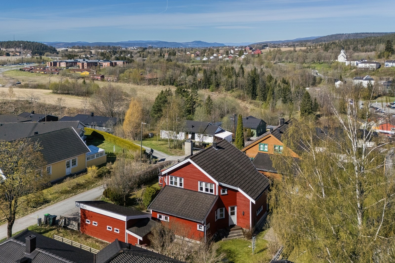 Her kan du bo i et rolig og barnevennlig nabolag med landlig preg. Galleribilde