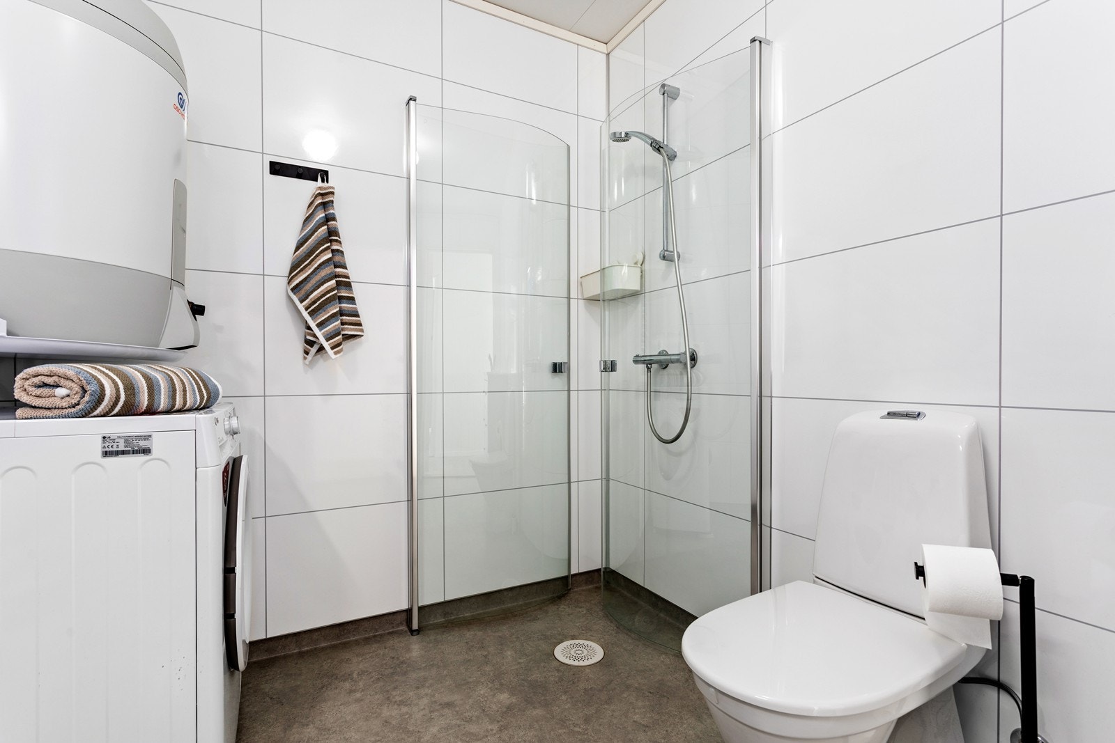 Badet har opplegg til vaskemaskin. Galleribilde