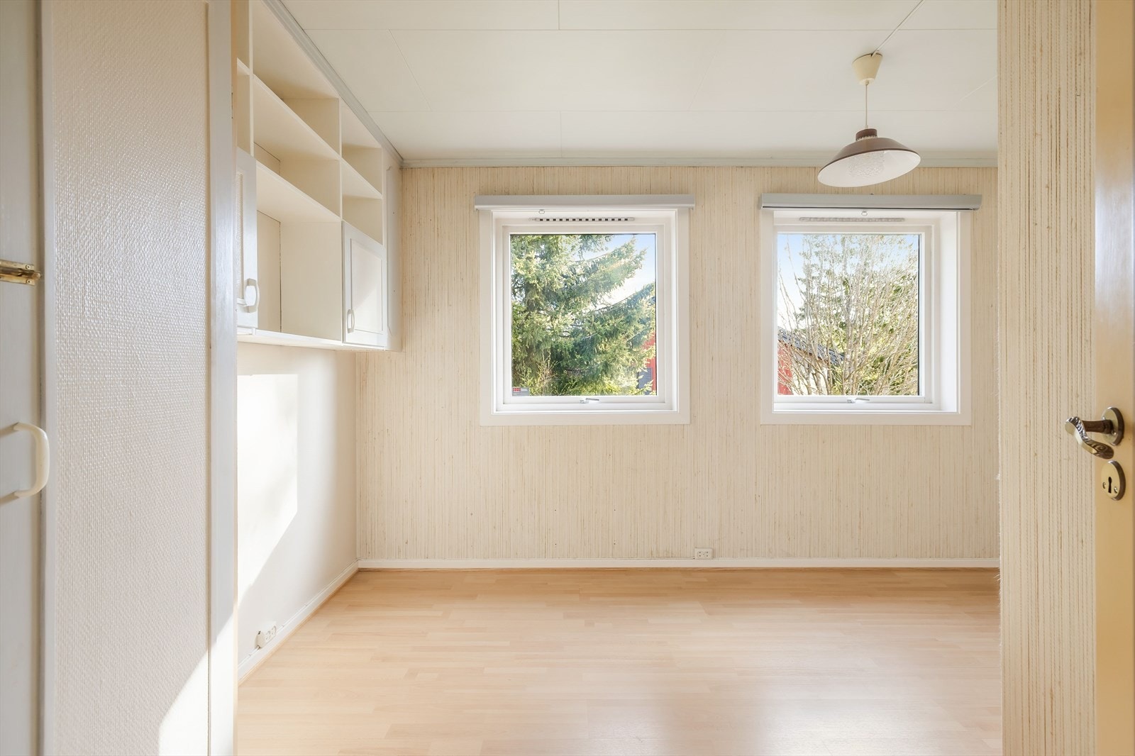 Et lyst og behagelig rom. Galleribilde