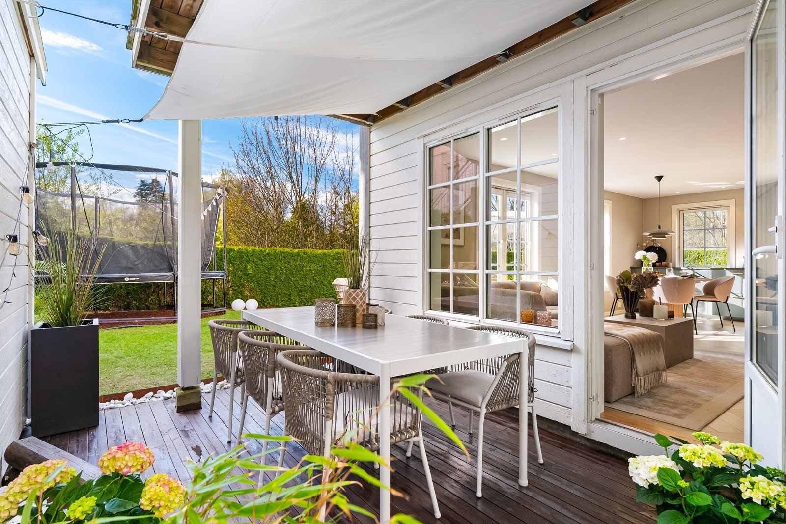 Lun makrterrasse på 13 kvm med ettermiddagssol. Galleribilde