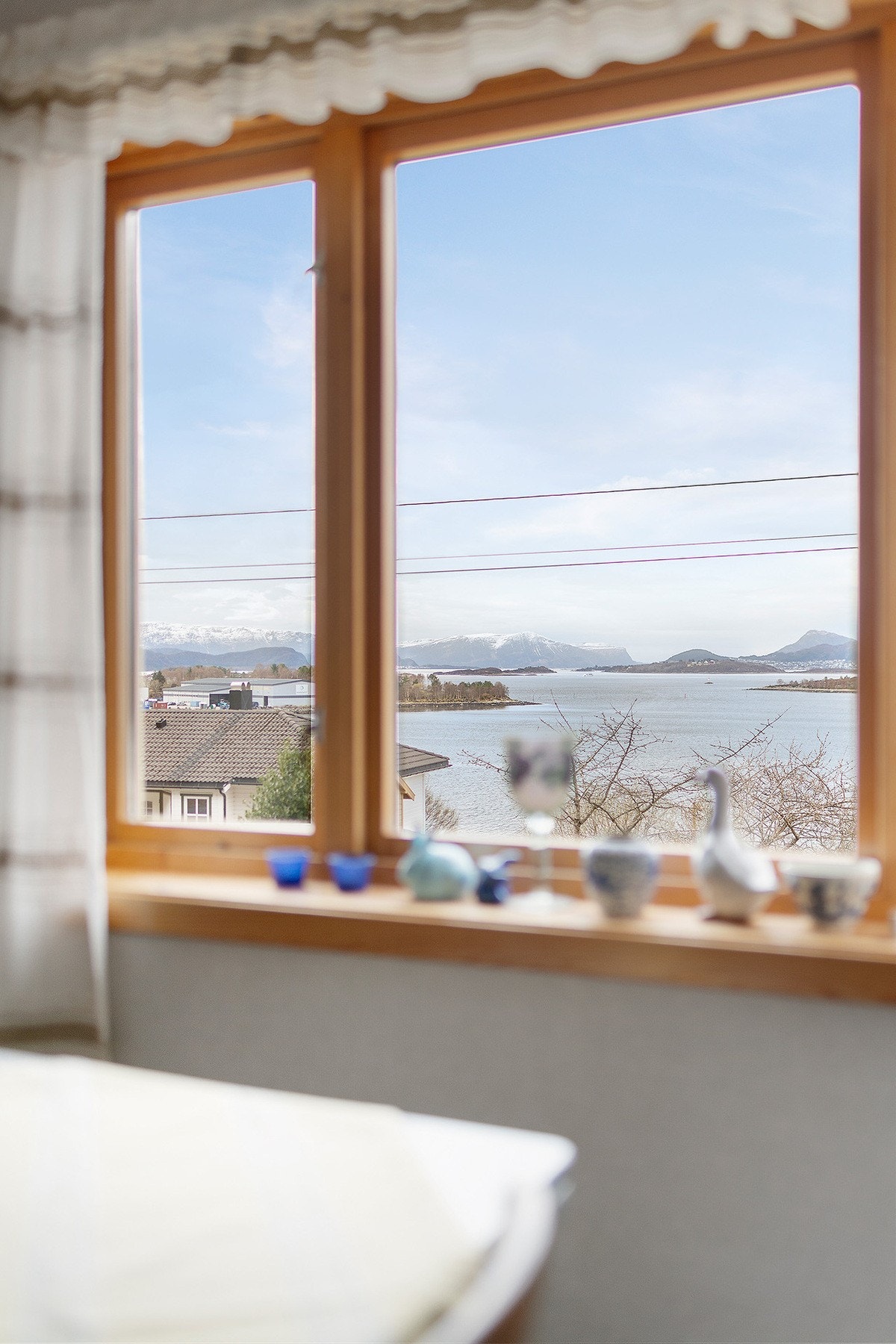 Stue med panoramautsikt og nydelig kveldssol Galleribilde