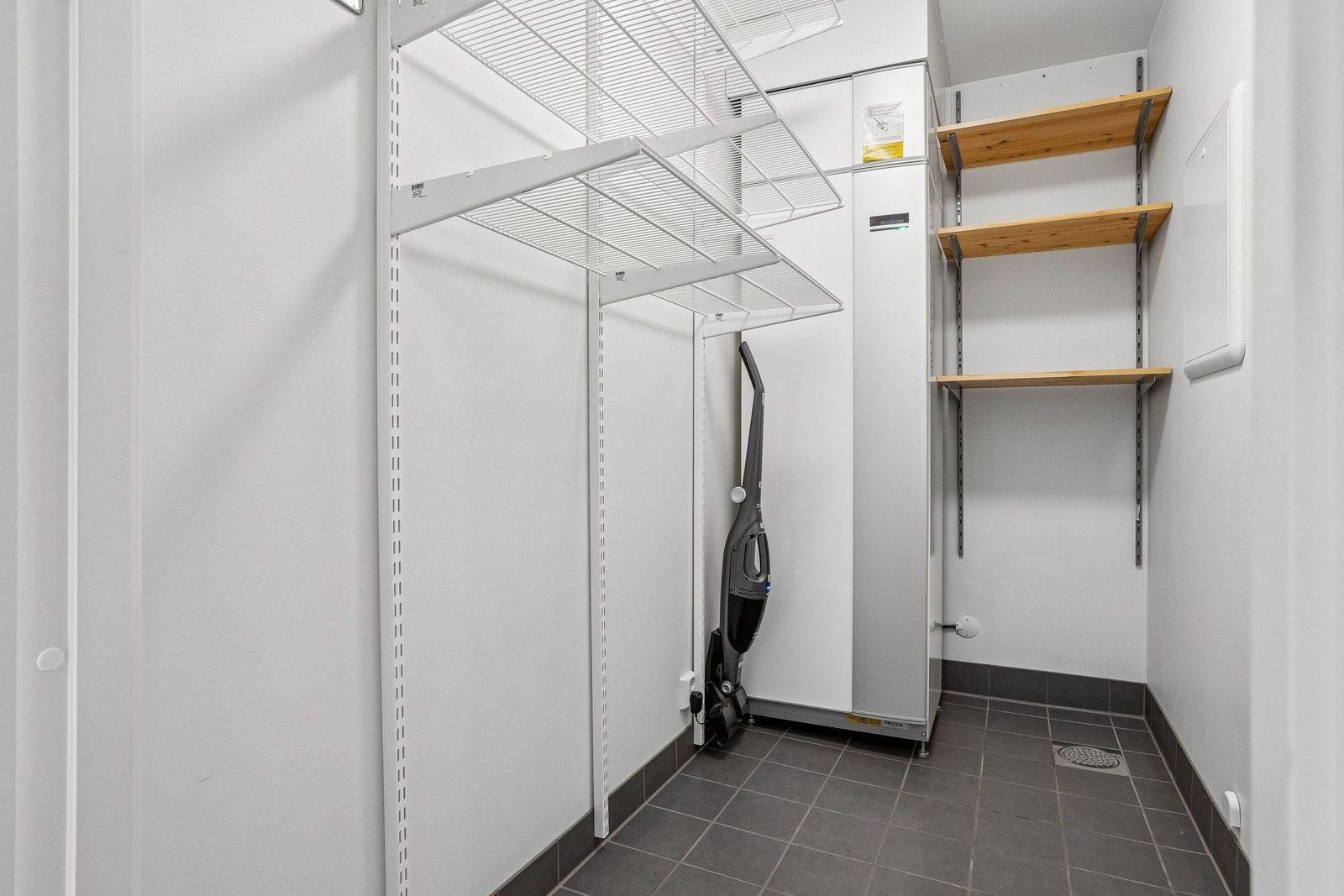Innvendig bod/teknisk rom i leiligheten. Galleribilde