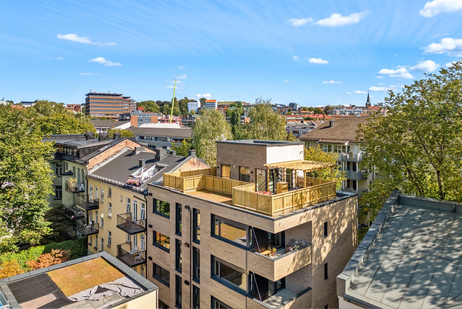 På toppen av bygg C finner man en felles takterrasse til glede for alle beboerne. Galleribilde