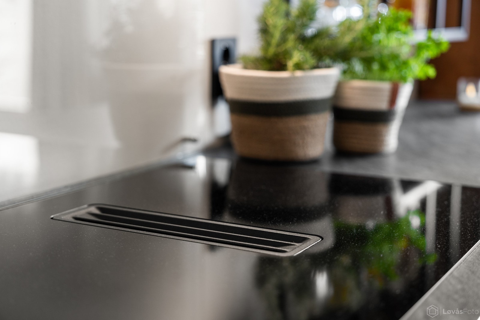 Den moderne platetoppen har en integrert ventilator. Galleribilde